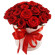 красные розы в шляпной коробке. Барбадос